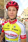 Male cyclist wearing a colorful uniform