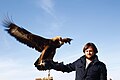 Man holding an eagle.jpg