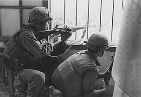 Marines Fire From a House Window, February 1968 (16242259837) (cropped).jpg