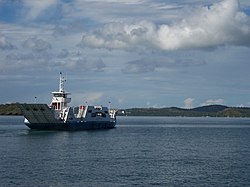 Ferry in motion between Dzaoudzi and Mamoudzou Mayotte Bac.JPG