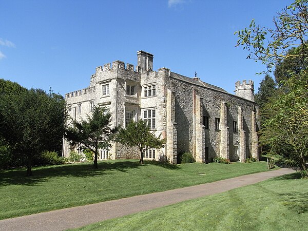 Old Shute House, Devon, viewed from SE. The wall on the east (right) now shored up with buttresses formed the western wall of the 16th-century additio