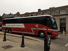 A Peoria Charter bus on Wright Street on the campus of the University of Illinois at Urbana-Champaign PCC Bus on Wright 2.JPG