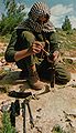 A PFLP veteran cleaning his rifle, 1969