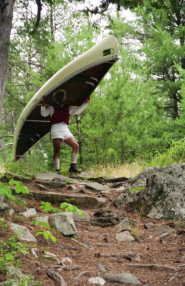 Portaging a tandem prospector in Algonquin Park