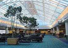 The original carpet, pictured at Concourse D in 2007, was designed by SRG Architects in 1987. Portland International Airport Concourse D - Oregon.JPG
