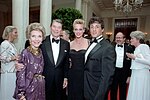 Thumbnail for File:President Ronald Reagan and Nancy Reagan posing with Sylvester Stallone and Brigitte Nielsen.jpg