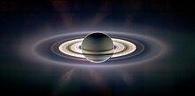 Images like this from the Cassini spacecraft (a mosaic of actual photographs with exaggerated color) inspired the final scene, "Ringshine - (Saturn)." Saturn eclipse exaggerated.jpg