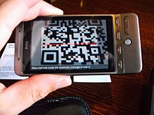Barcode Scanner scanning a QR code Scanning QR codes on business cards.jpg