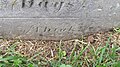 The word Think at bottom of gravestone