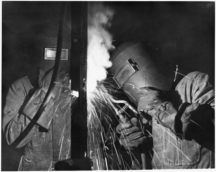 File:Stanley Squetinkim of Keller, a member of the Colville Indian Tribe, is shown drilling bed castings for local use in... - NARA - 298659.jpg