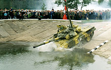 An early series T-90 with cast turret during a military exercise in Russia, demonstrating deep fording T-90 snorkel.jpg