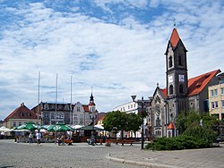 The market square (Rynek) in Tarnowskie Góry with the Neo-Romanesque Protestant church on the right side