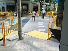Temporary curb ramp at construction site (18602577880).jpg