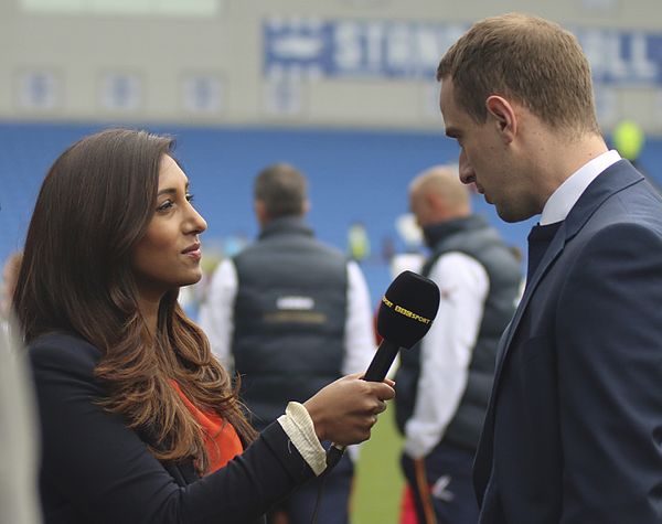 Daheley interviews former England women's national football team coach Mark Sampson in 2014