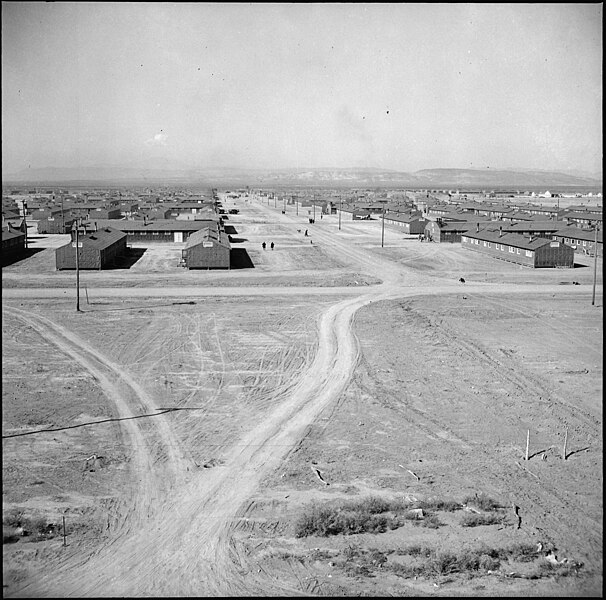 File:Topaz, Utah. Looking down a main thoroughfare at the Topaz Relocation Center. - NARA - 538677.jpg