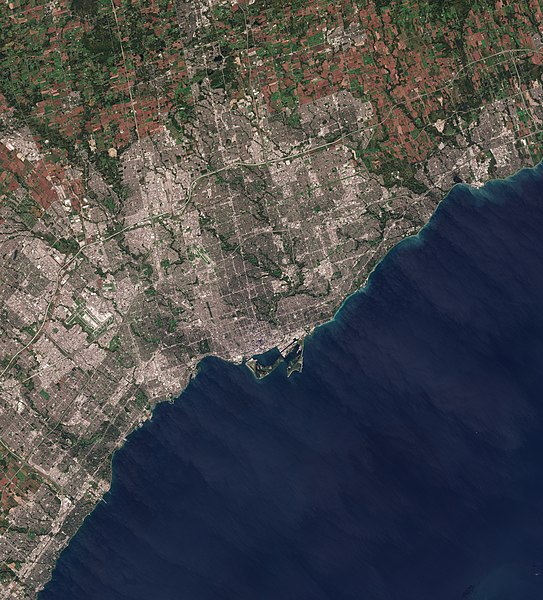 Toronto and its surrounding municipalities. The Greater Toronto Area is the largest metropolitan area in the Corridor.