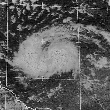 Satellite image of a large area of clouds to the east of the Lesser Antilles