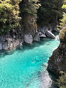 Fish are stocked all over the world. This river in Mount Aspiring National Park, New Zealand, is stocked with trout. Trout Stocked in New Zealand.jpg