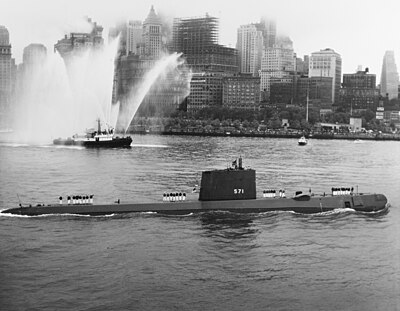 August 3, 1958: U.S. nuclear submarine Nautilus is first to sail under the North Pole (shown arriving in New York City for August 25 welcome celebration) USS Nautilus SSN-571 - 0857108.jpg