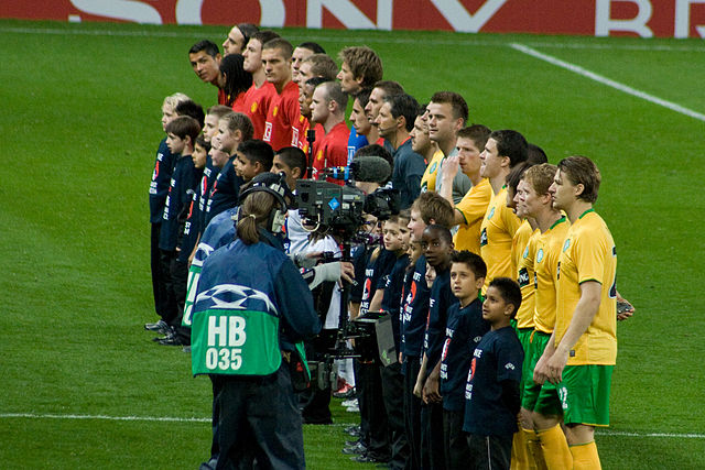 Manchester United and Celtic line up prior to their Group E match at Old Trafford on 21 October 2008.