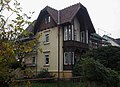 Detached house with a fence