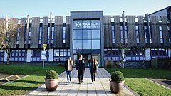 The main entrance to the campus in Derriford, Plymouth in April 2021