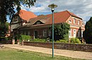 School farmstead, consisting of the former one-class school with attached classroom building and stable storage