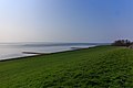 Zicht op twee pieren in het IJsselmeer. Locatie. Reaklif (Het Rode Klif).