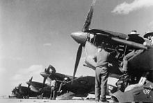 No. 451 Squadron Spitfire fighters being serviced at a North African airfield in early 1944.