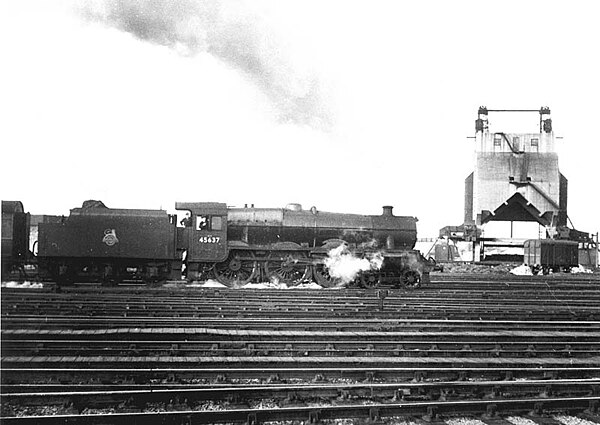 LMS Jubilee no. 45637 Windward Islands hauling an express train at Rugby station.