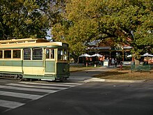 A heritage tram passes the Lake Wendouree Pavilion in Ballarat Ballarat tram.jpg