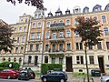 Apartment building in closed development with front garden