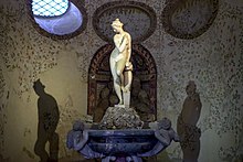 Bathing Venus by Giambologna as seen in the third chamber of the Buontalenti Grotto Bathing Venus statue in Buontalenti Grotto, Boboli Gardens, Florence.jpg