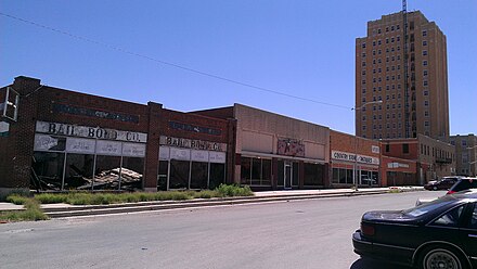 Pictured are the Settles Hotel of Big Spring, which was renovated in 2012, and an abandoned row of buildings downtown, which were not.