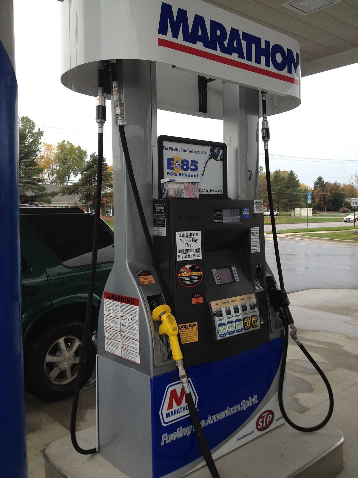 What happens when a gallon of sugar water is added to a car's gas tank?