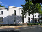 These double-storeyed buildings, in the predominantly Georgian style, probably all date from the beginning of the 19th century. This group of houses forms an almost perfect unit and also forms an important element in the street scene of the historic Dorp Street. Bosman House.JPG