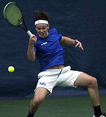 A Buffalo men's tennis player participating in a match in 2019 Buffalo tennis (cropped).jpg