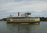 A Casco Bay Lines ferry sailing "down the bay" after stopping at Diamond Cove. Casco Bay Lines ferry Aucocisco III passing Peaks Island, 2006.jpg