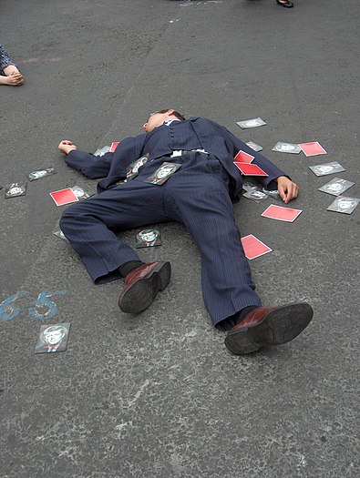 Pretending to be dead to advertise for a play about JFK, 2006
