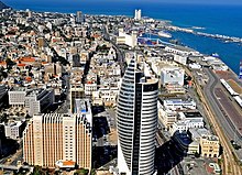 The lower town of Haifa, an area where Arabs, both Christians and Muslims, comprise around 70% of the residents. Downtown Haifa including the port and the sail tower.jpg