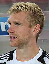 Per Mertesacker made 221 appearances for Arsenal and is the current Arsenal Academy manager. FIFA WC-qualification 2014 - Austria vs. Germany 2012-09-11 - Per Mertesacker 01 (cropped).JPG