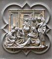 งานโลหะบน บานประตูหอศีลจุ่ม "พระเยซูถกกับปราชญ์ในวัด" โดยโลเรนโซ กีแบร์ตี (ค.ศ. 1425-1452)