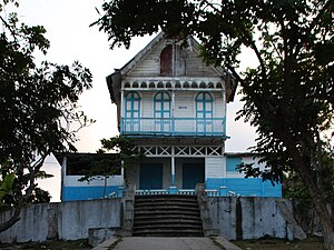 Gingerbread house in Haiti Feb 2008 Landscape.jpg