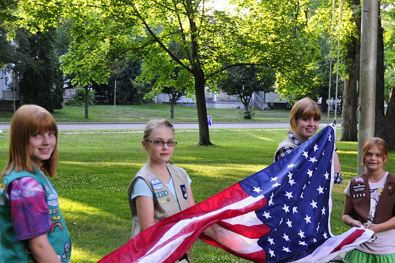 File:Girl scouts raising US flag.jpg