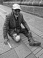 An amputee of the right leg photographed in the Historic Center of Quito in 2013.