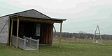 Reproduction of the Wright brothers' 1905 hangar and catapult at the Huffman Prairie