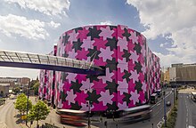 The pink and black interlocking design, Infinity Pattern 1, was co-commissioned by Selfridges and the city’s Ikon art gallery. Created by multidisciplinary artist Osman Yousefzada
