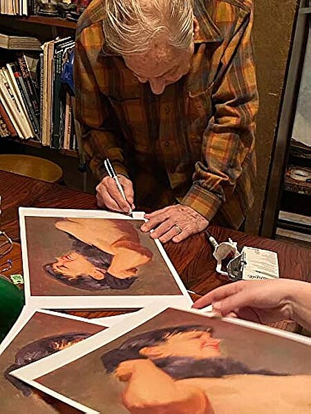 File:Jack Faragasso signing a print of a photograpgh that he took of Bettie Page.jpg