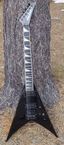 The first King V Custom in black with Kahler tremolo ever built. It is serial number J0506. It was completed 10/9/86 and predates Dave Mustaine's first King V by 17 months. Jimshinekingv.jpg