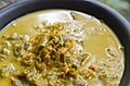 'Kaeng khua mu bai chamuang' is a thick central Thai curry with pork and the leaves of the chamuang tree